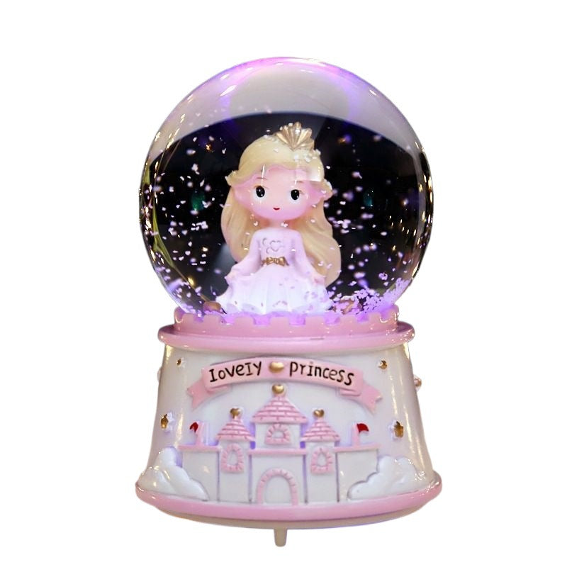 Christmas music box with snow globe and light