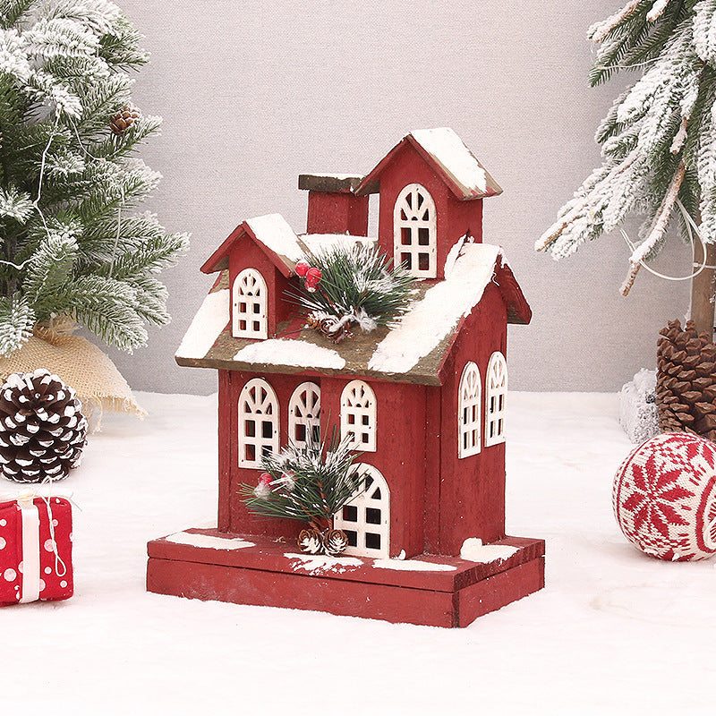 Illuminated red wooden house, Christmas decoration