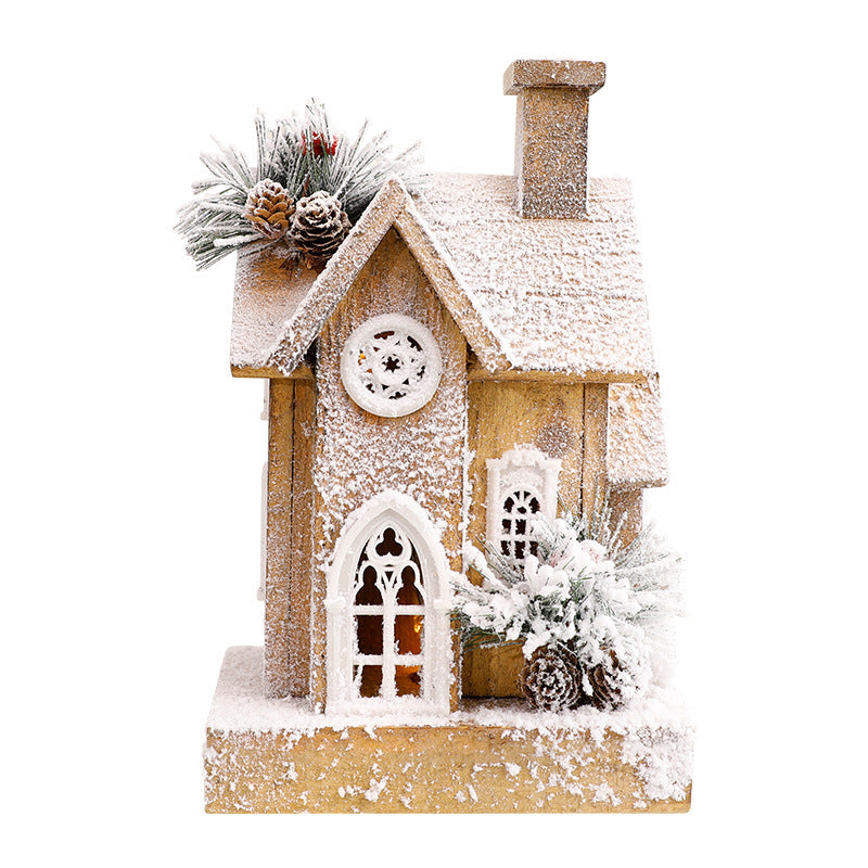 Illuminated Christmas Wooden House with Snow Landscape