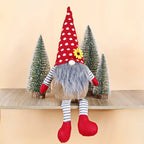 Christmas elf figure with long legs, sitting