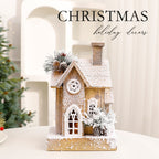 Illuminated Christmas Wooden House with Snow Landscape