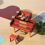 Wooden music box in piano shape with metal feet