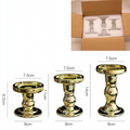 Candle holder in Roman column design with gold rim