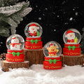Illuminated glass snow globe with snow effect
