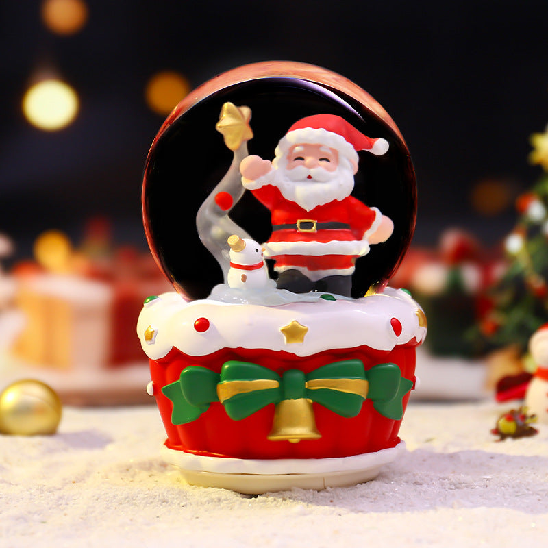 Christmas music box with glass sphere and snow effect