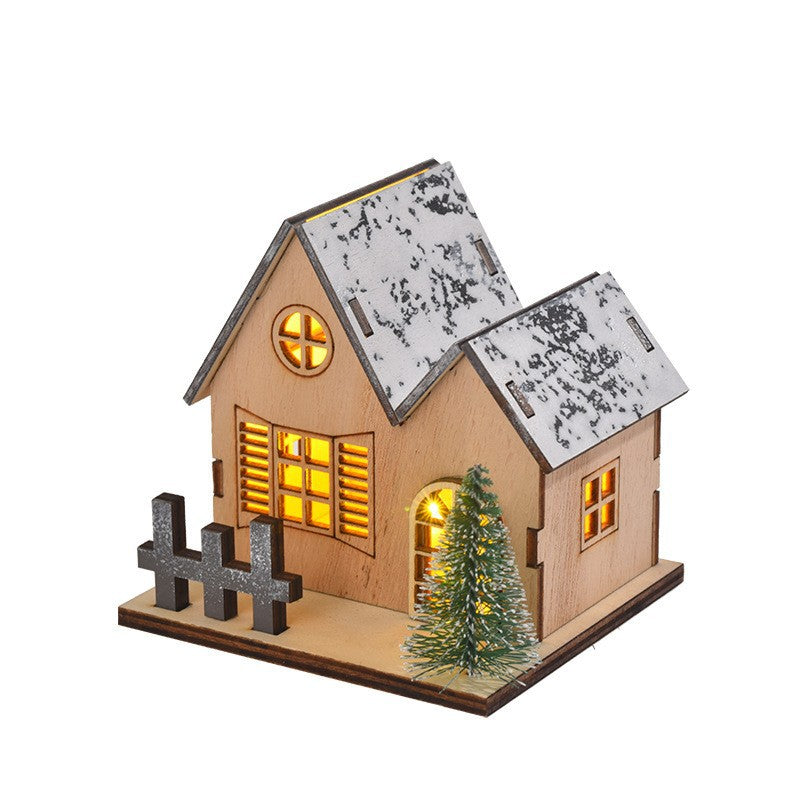 Illuminated Christmas wooden house in Scandinavian style