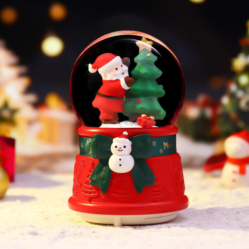 Christmas music box with glass sphere and snow effect