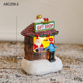 Illuminated Christmas house made of resin