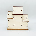 Illuminated wooden house for Christmas decoration