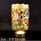 Rotating tealight holder made of brass, classic design