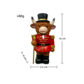 Decorative nutcracker and highland cattle figures made of resin