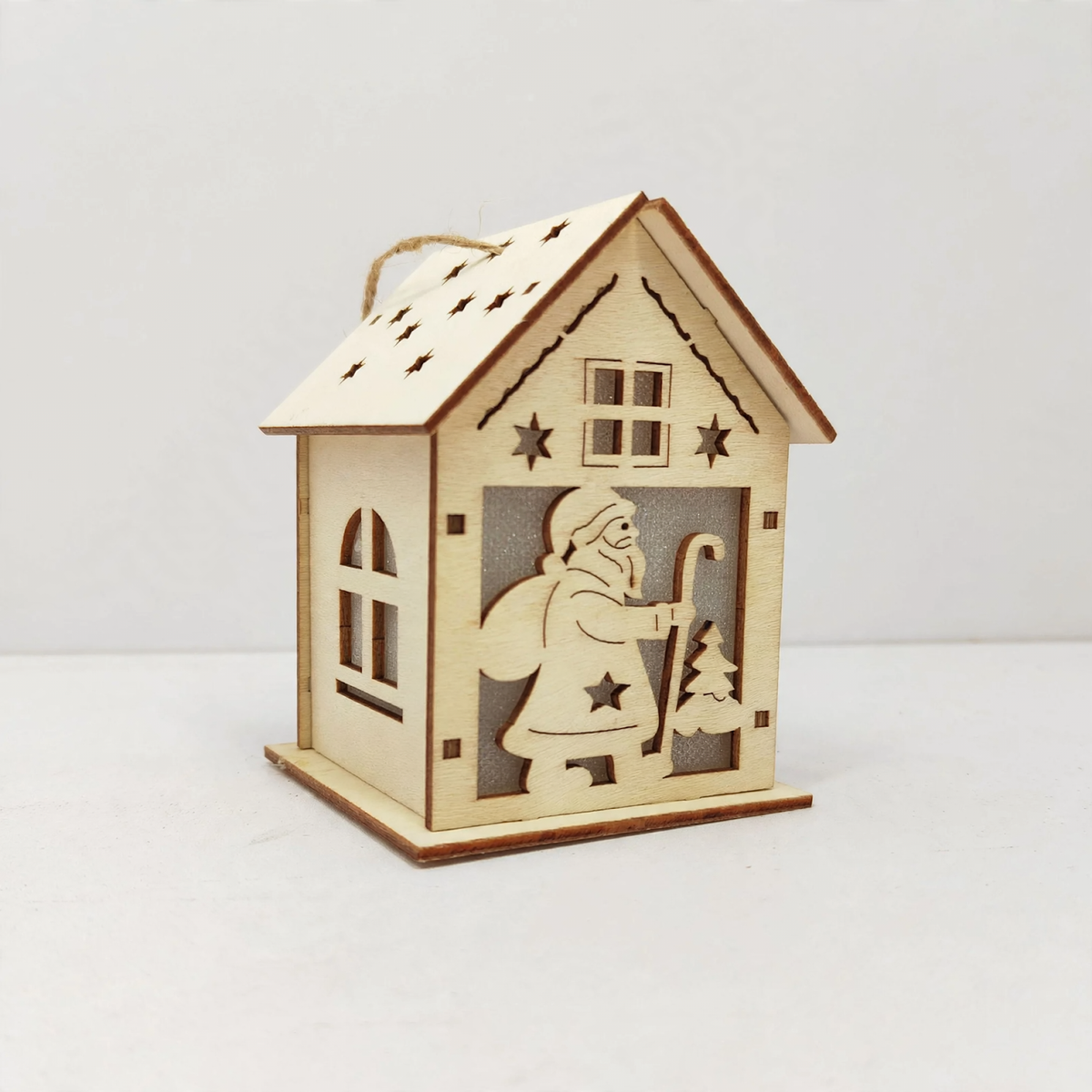 Handcrafted Christmas wooden house as decoration