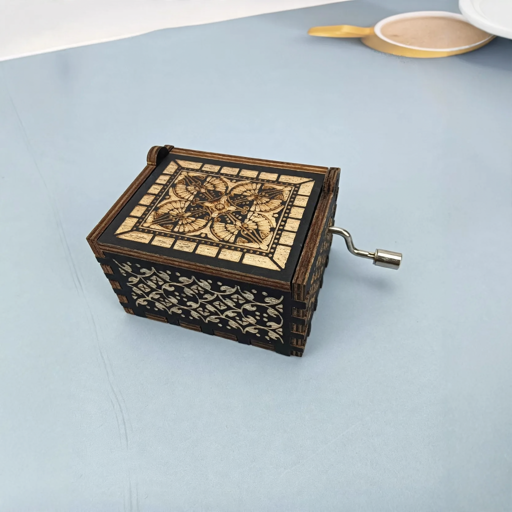 Hand-crank music box made of wood with laser engraving