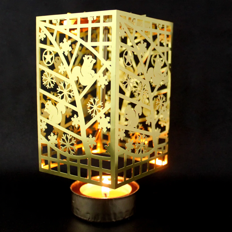 Rotating metal candle holder, gold-colored
