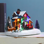 Illuminated Christmas village house made of resin