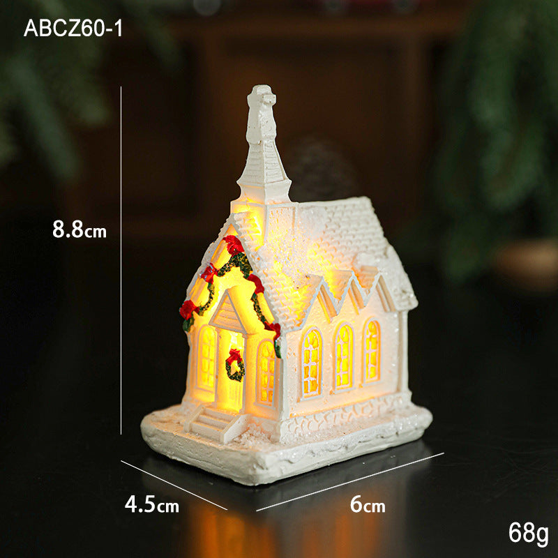 Illuminated miniature snow house made of resin