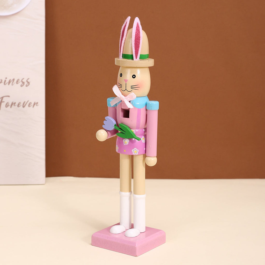 Decorative wooden nutcracker figure with rabbit ears