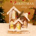 Illuminated Christmas Wooden House with Snow Landscape
