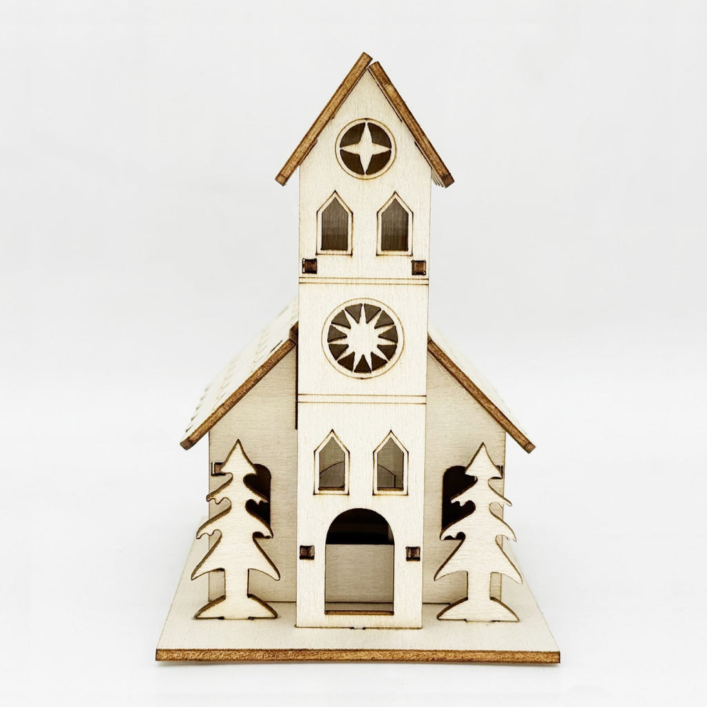 Illuminated wooden house for Christmas decoration