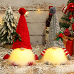 Glowing Christmas gnome with knitted hat