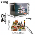 Illuminated music box with rotating train