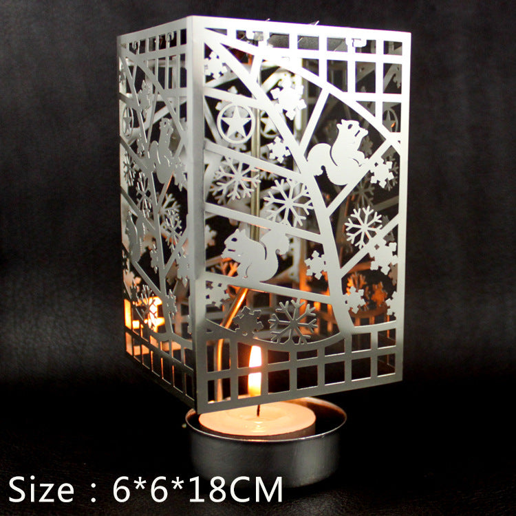 Rotating metal candle holder, gold-colored