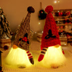 Glowing elf figure with knitted hat
