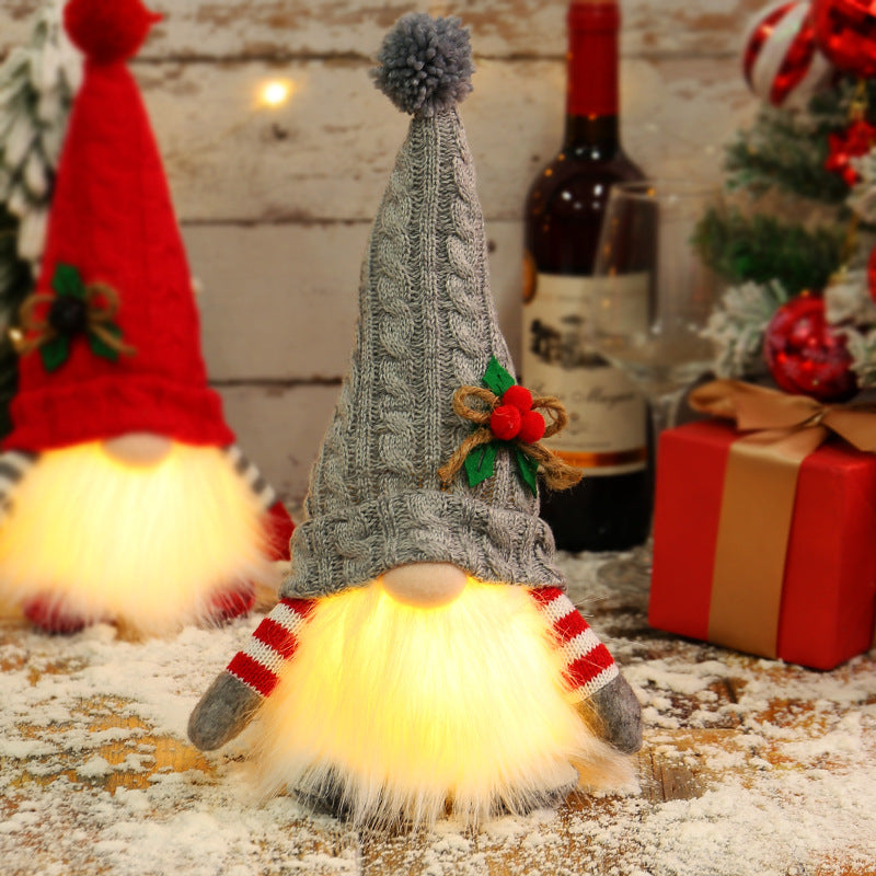 Glowing Christmas gnome with knitted hat