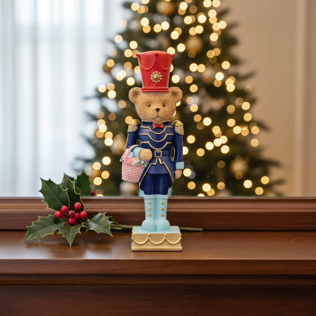 Decorative nutcracker figure with bear, synthetic resin