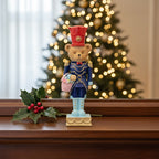 Decorative nutcracker figure with bear, synthetic resin