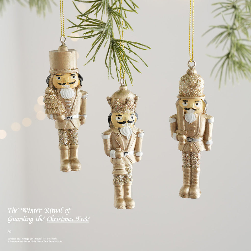 Golden nutcracker pendant made of resin for the Christmas tree