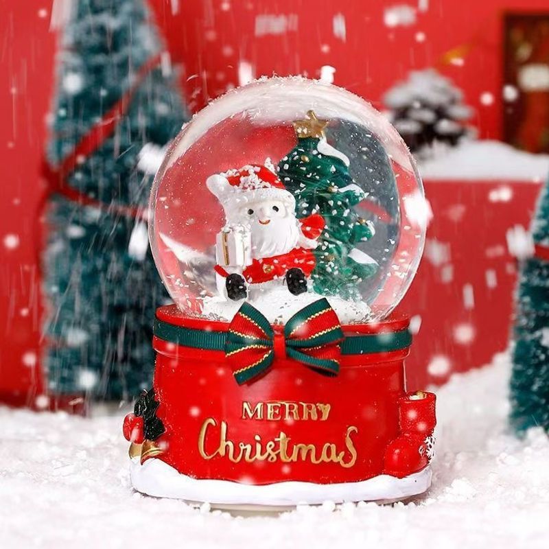 Christmas music box with glass sphere and snow effect
