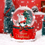 Christmas music box with glass sphere and snow effect