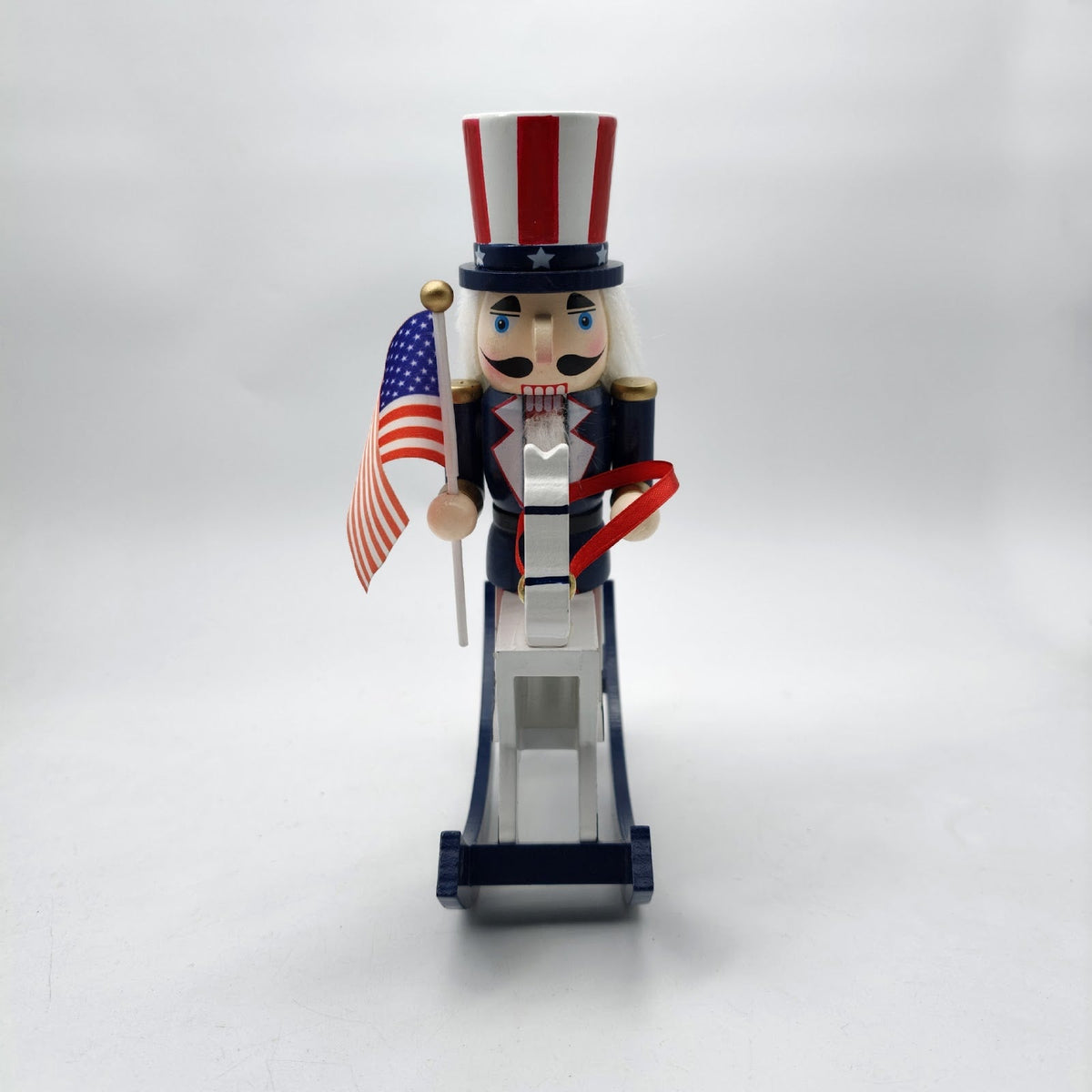 Nutcracker figure on rocking horse, 26 cm