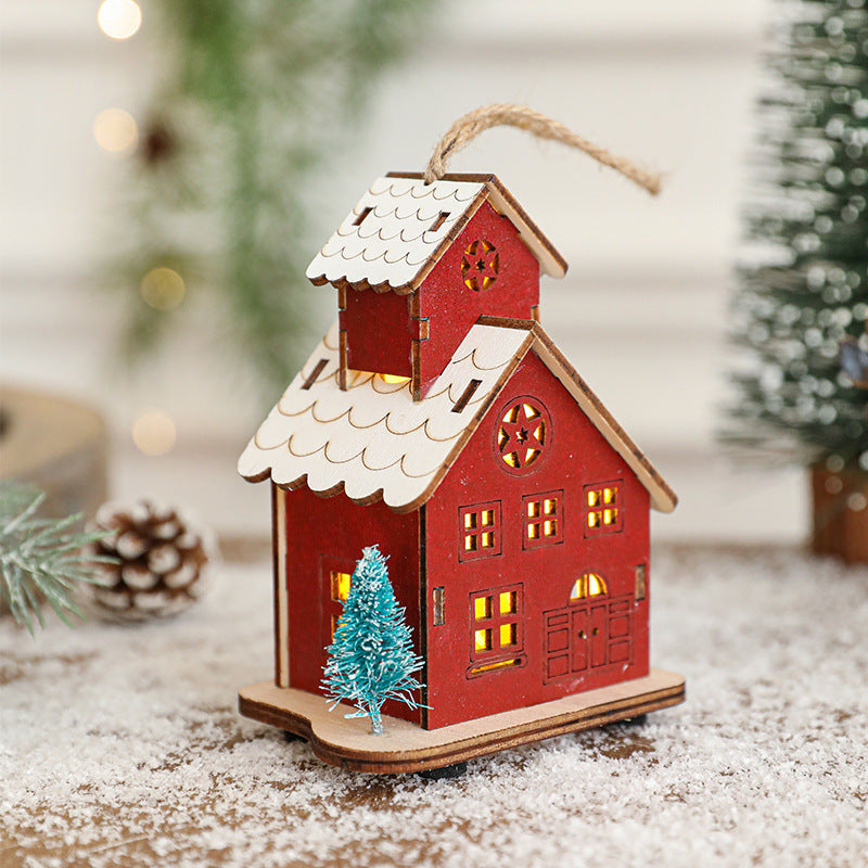 Illuminated wooden house for Christmas decoration