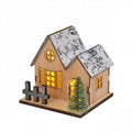 Illuminated wooden house for Christmas decoration