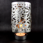 Rotating tealight holder made of brass, Christmas design