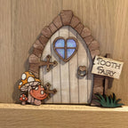 Decorative 2D elf door made of pine wood with animal motifs