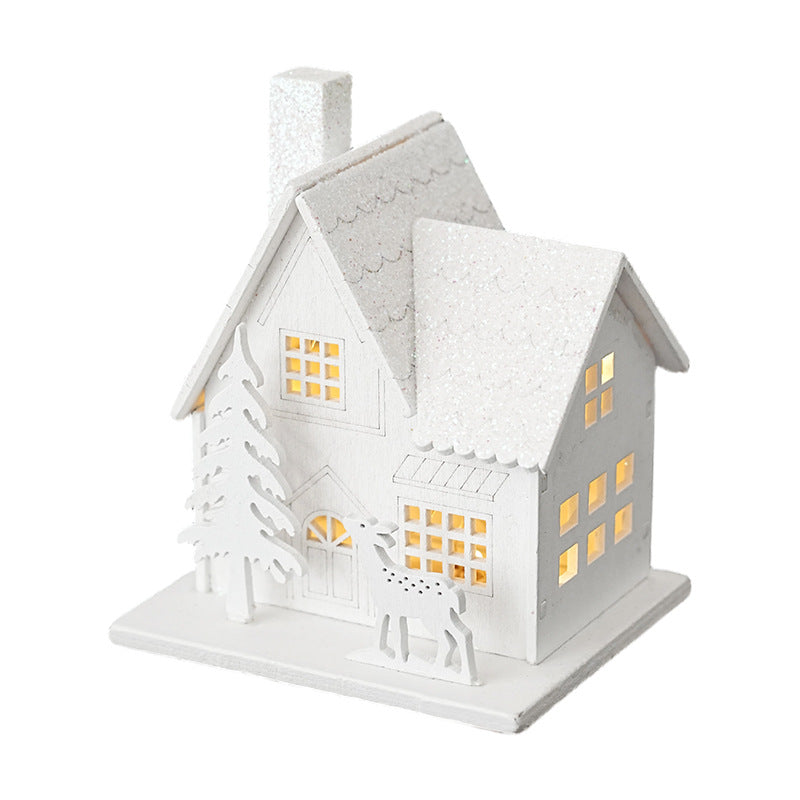 Illuminated wooden house for Christmas decoration