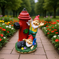 Gnome figure with red hat and hydrant motif