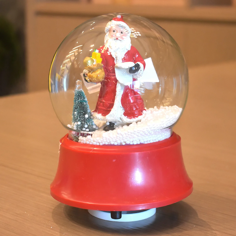 Christmas music box with snow globe effect