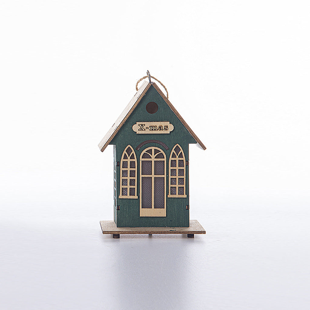 Illuminated wooden house for Christmas decoration