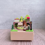 Manual music box made of beech wood with forest train motif