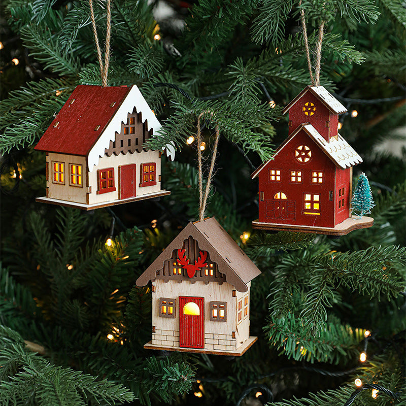 Illuminated wooden house for Christmas decoration