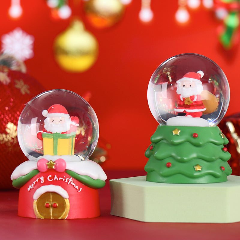 Christmas snow globe with lighting and glitter effect