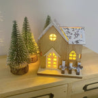 Illuminated wooden cabin model for Christmas
