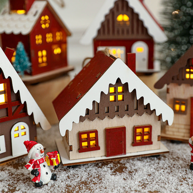 Illuminated wooden house for Christmas decoration