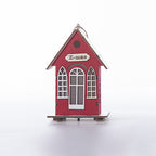 Illuminated wooden house for Christmas decoration
