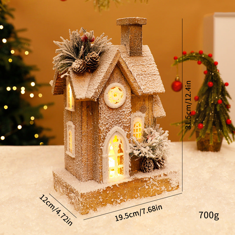 Illuminated Christmas Wooden House with Snow Landscape