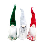 Christmas elf figure with long legs, sitting